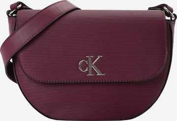 Calvin Klein Jeans Axelremsväska 'MINIMAL MONOGRAM SADDLE' i röd: framsida