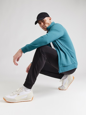 PUMA Тренировочный костюм 'Class' в Зеленый