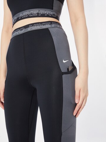 NIKE Skinny Sports trousers in Black