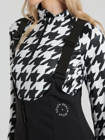 évasé Pantalon de sport South Beach en noir