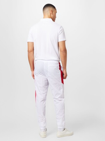 Sergio Tacchini Tapered Παντελόνι φόρμας 'ORTICA' σε λευκό