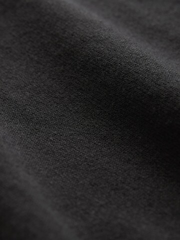 Next Sweater in Black