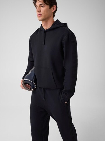Felpa 'Z6YQ17K4963' di GUESS in nero