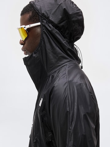 THE NORTH FACE Куртка в спортивном стиле 'MRIDGELITE' в Черный