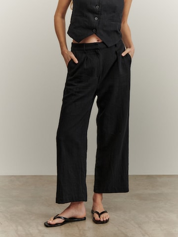 ABOUT YOU x Marie von Behrens Wide leg Pleat-Front Pants 'Magdalena' in Black: front