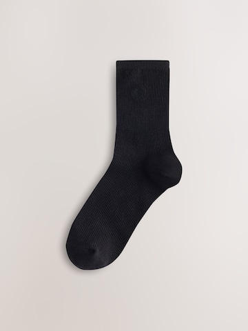 Next Sockor i grå