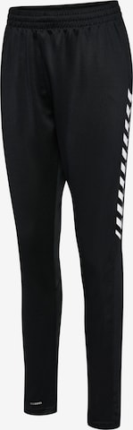 Tapered Pantaloni sportivi di Hummel in nero