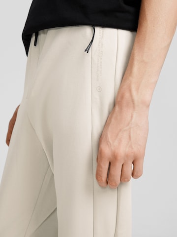 Bershka Zúžený Kalhoty – béžová