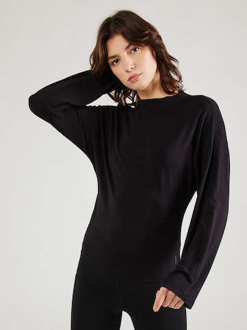 CURARE Yogawear Performance Shirt in Black: front