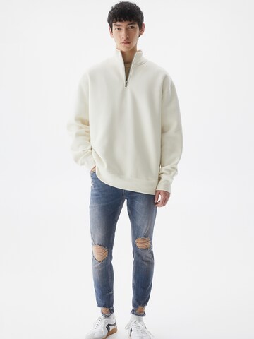 Slimfit Jeans de la Pull&Bear pe albastru: față