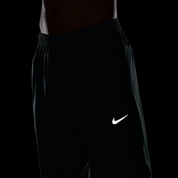 NIKE Tapered Workout Pants in Green