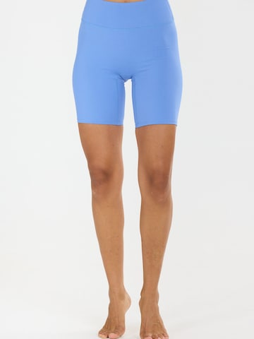 Skinny Pantaloni sport 'Blossom' de la Athlecia pe albastru: față