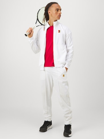 Veste de survêtement 'Heritage' NIKE en blanc