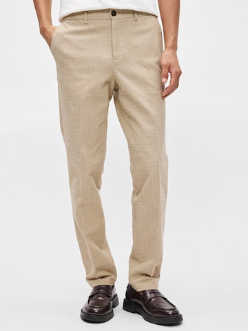 Coupe slim Pantalon à plis 'STUART' SCOTCH & SODA en beige : devant