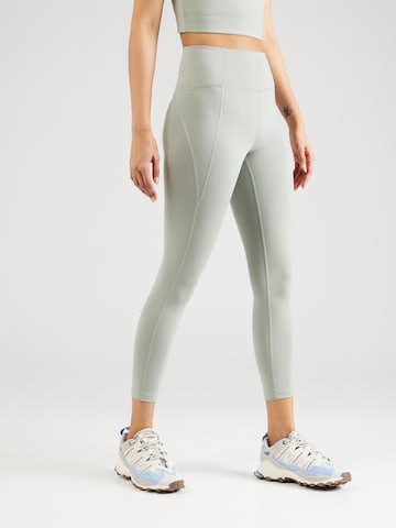 Girlfriend Collective Skinny Sportovní kalhoty – zelená: přední strana