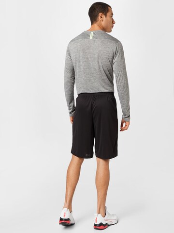 PUMA Regular Sportshorts in Schwarz