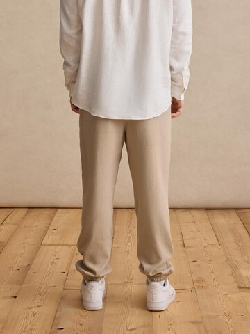 DAN FOX APPAREL Tapered Hose 'Gino' in Beige