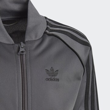 ADIDAS ORIGINALS Strój do biegania 'Adicolor Sst' w kolorze szary