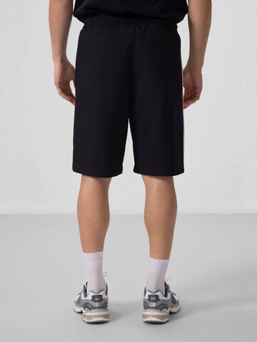 Loosefit Pantaloni di Tommy Life in nero