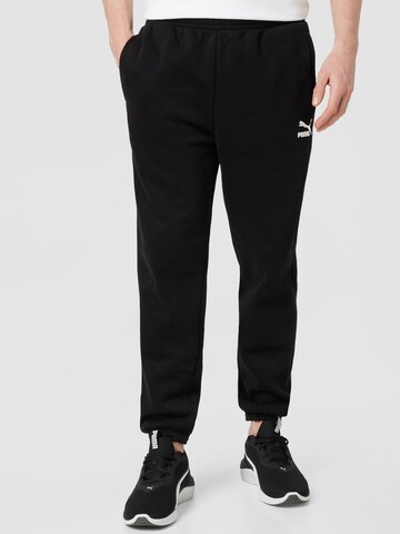 PUMA Tapered Pants in Black: front