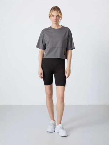 Maglia extra large di Tommy Life in grigio