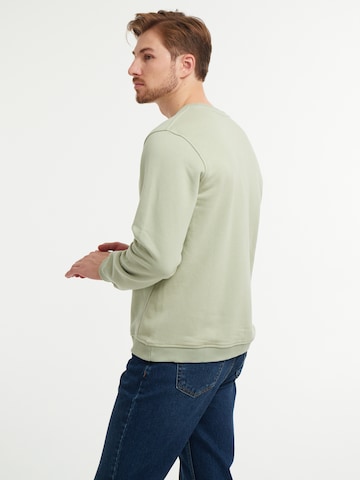 Sweat-shirt 'Spell' WEM Fashion en vert
