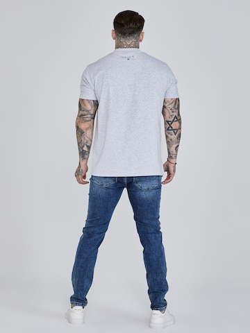 Coupe slim Jean SikSilk en bleu