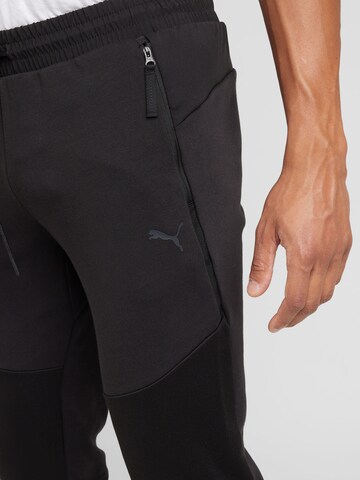 PUMA - Tapered Pantalón en negro