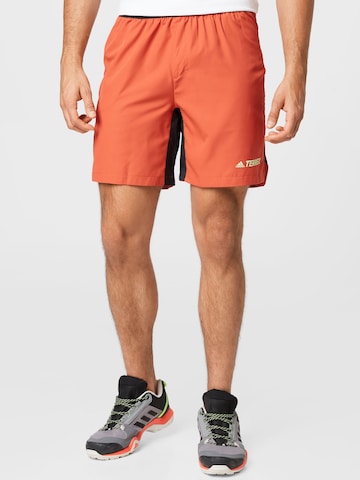 adidas Terrex Workout Pants in Orange: front