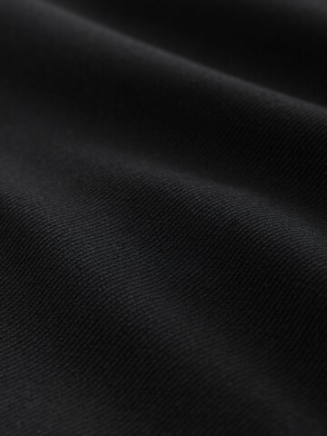 Next - Chaqueta de entretiempo 'Motionflex' en negro