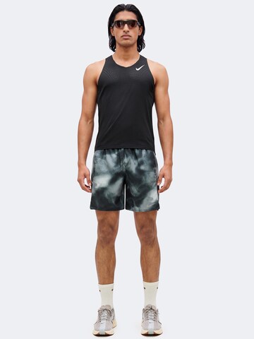 NIKE Regular Sportbroek 'Miler' in Zwart