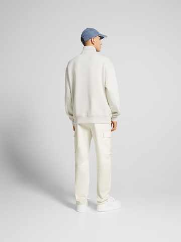 Bershka Regular Cargo trousers in White