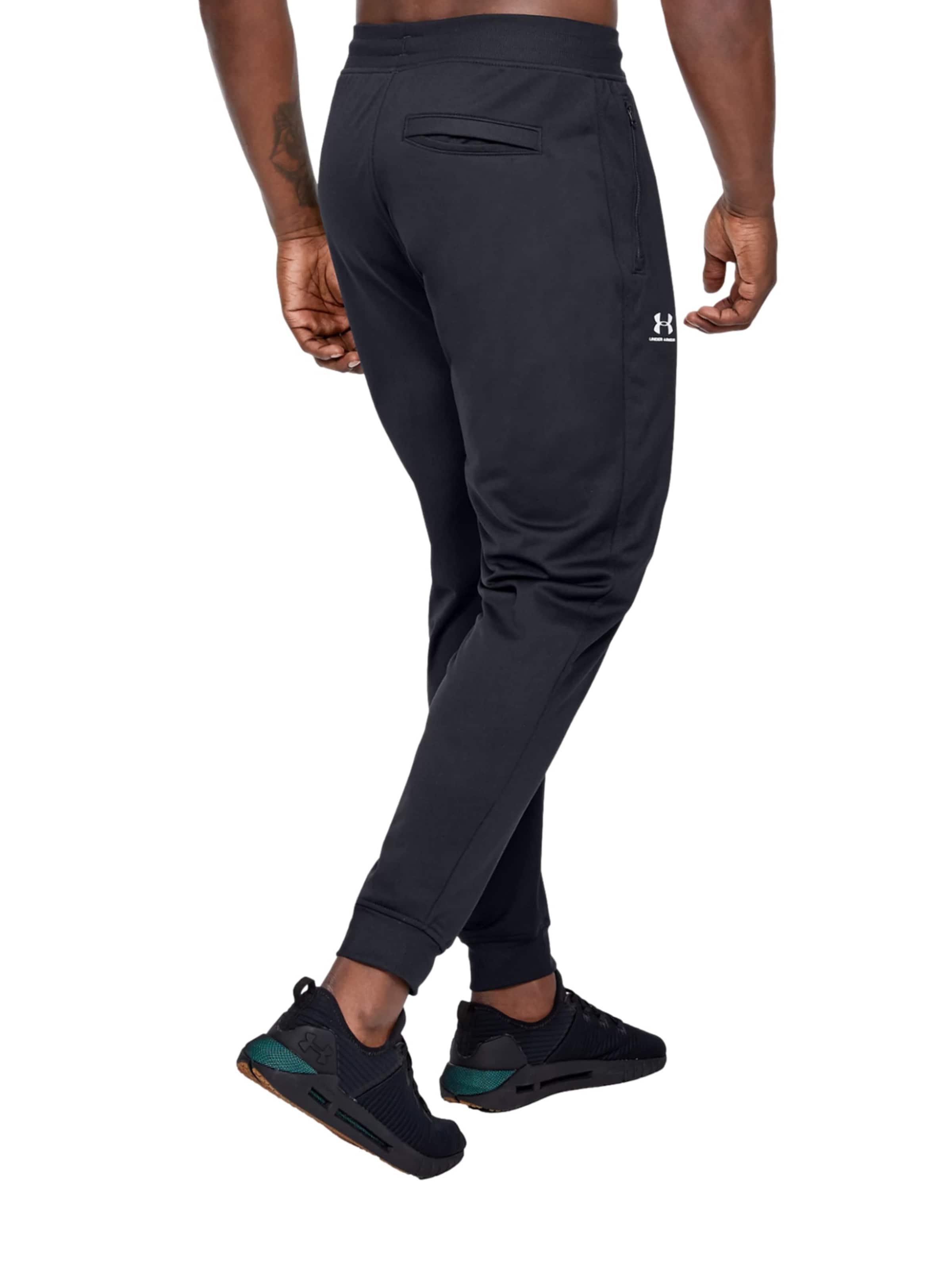 Loosefit Pantalon de sport 'Sportstyle' UNDER ARMOUR en noir