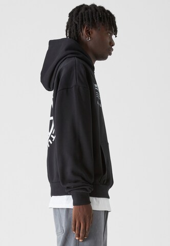 Lost Youth Sweatshirt 'Influenced' i svart