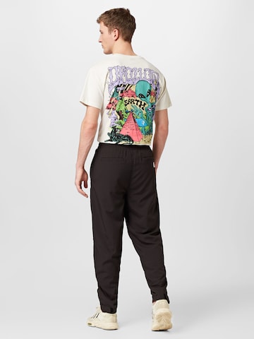 Karl Kani Loose fit Pants in Black