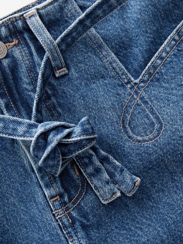 Next Rok in Blauw