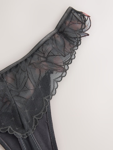 Next String 'N.Premium' i svart
