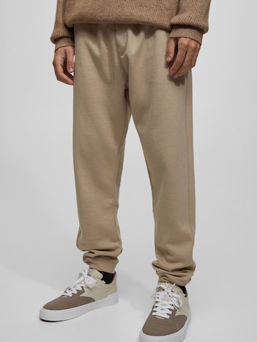 Tapered Pantaloni di Pull&Bear in beige: frontale