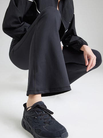 Evazați Pantaloni 'Harmony' de la new balance pe negru