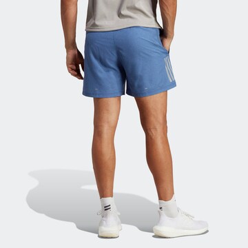 regular Pantaloni sportivi 'Own The Run' di ADIDAS PERFORMANCE in blu