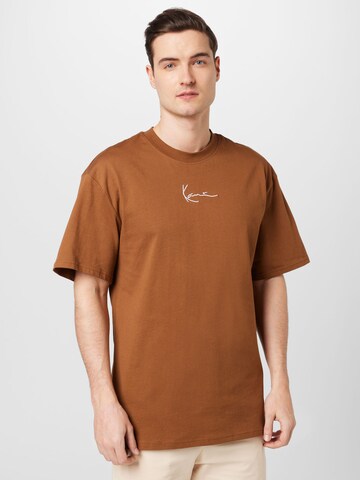 T-Shirt Karl Kani en marron : devant