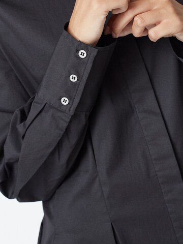 Robe-chemise 'Poppy' co'couture en noir