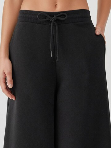 Hiccup - Folgado Calças em preto