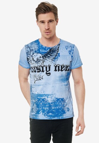 Rusty Neal Cooles T-Shirt mit Allover-Print in Blau: predná strana