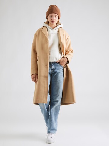 Tommy Jeans Between-seasons coat in Beige