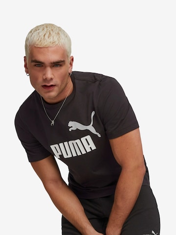 PUMA - Camiseta funcional 'Essentials' en negro