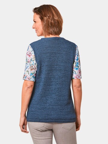 Goldner Strickweste in Blau
