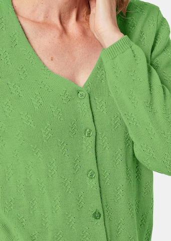 Goldner Strickjacke in Grün