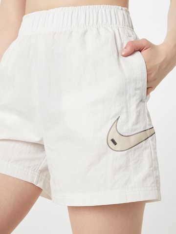 Nike Sportswear Loosefit Kalhoty – modrá