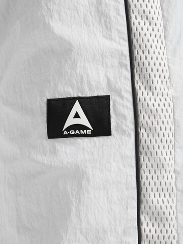 A-Game - Loosefit Calças de desporto em cinzento